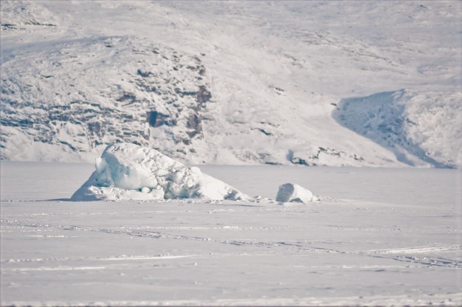 Iceberg-set-on-a-frozen-lake-in-Greenland