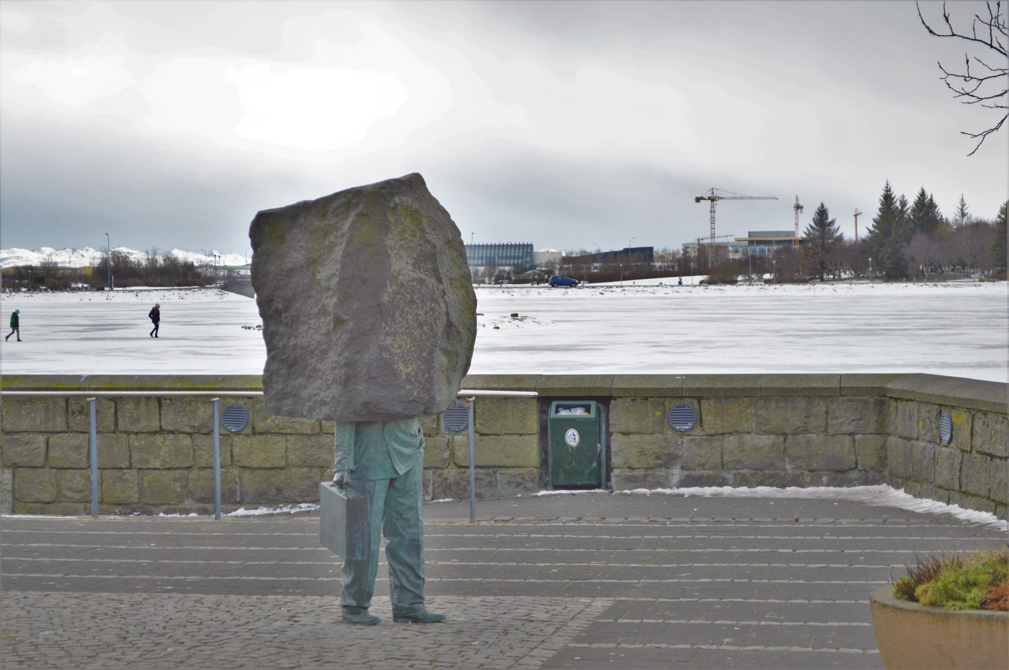 The Unknown Bureaucrat Statue at Lake Tjornin, Reykjavik, Iceland