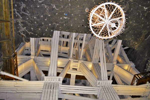 Light and wooden logs, Wieliczka Salt Mine, Krakow, Poland