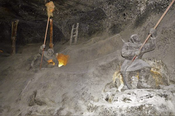 Worker statues with torches, Wieliczka Salt Mine, Poland
